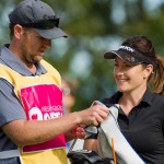 Rebecca Artis of Australia smiles after hitting her tee shot close on the 17th hole